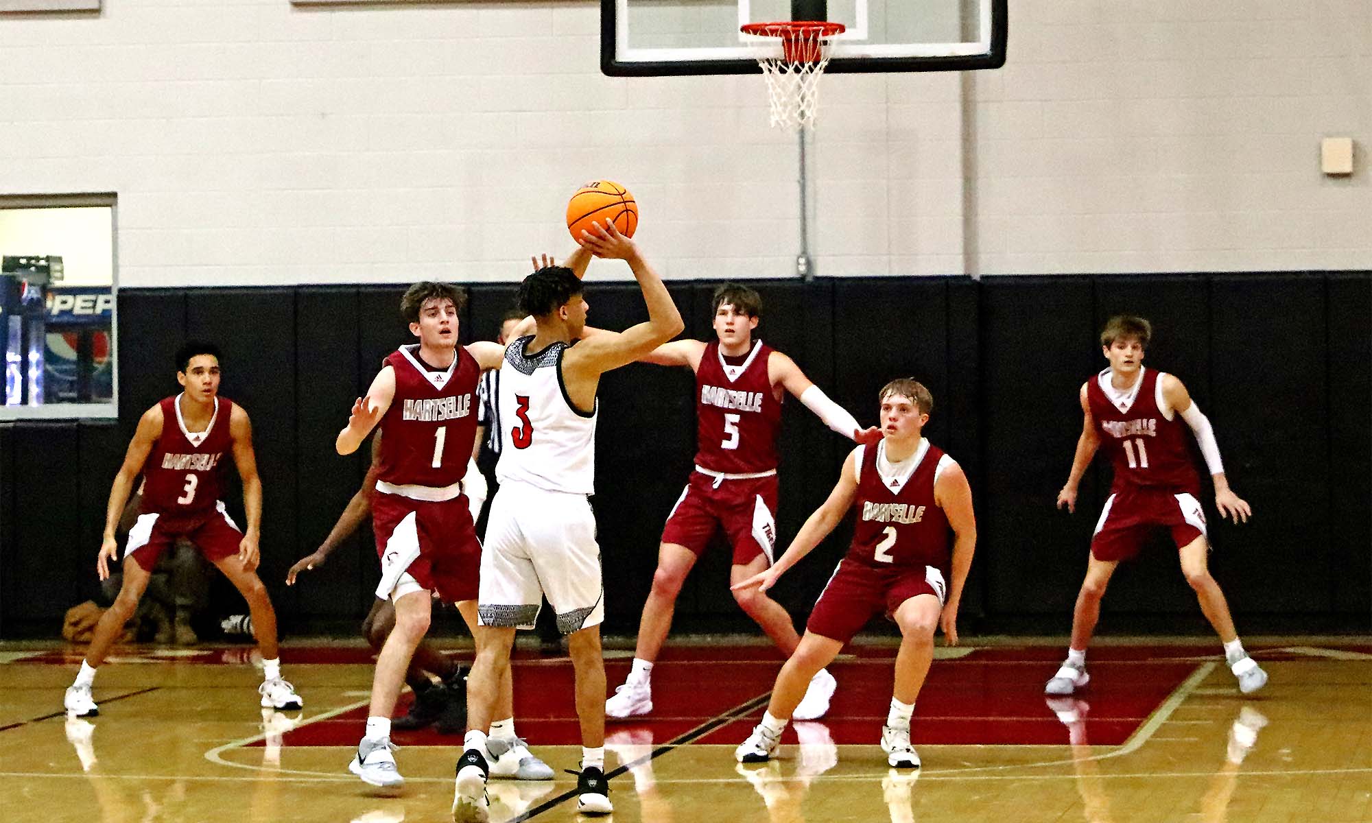 Tigers hold Muscle Shoals to 33 points in area clinching win